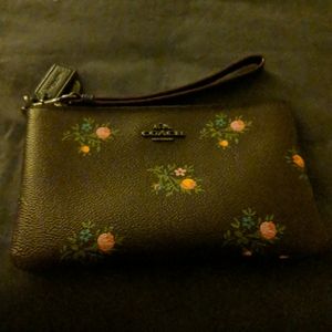 Coach wristlet, oxblood with floral print